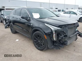 2023 Cadillac XT4 FWD Luxury with VIN 1GYAZAR49PF128552, listed as a IAAI auction lot 41806172 with 36,081 mi miles and . Bid and sale history available at carsss.com. Image 1.