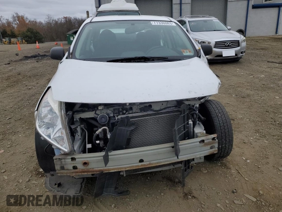 2014 Nissan Versa S with VIN 3N1CN7AP7EL849753, listed as a Copart auction lot 77336083 with 51,478 mi miles and Salvage Title. Bid and sale history available at carsss.com. Image 5.