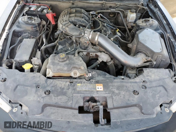 2012 Ford Mustang Premium z VIN 1ZVBP8AM6C5246219, wystawiony jako Copart lot #61443795 z przebiegiem 98 794 mil mil oraz Szkoda całkowita • Salvage title. Historia ofert i sprzedaży dostępna na DreamBid. Obrazek 11.