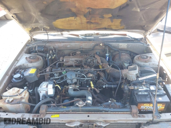 1986 Toyota Camry z VIN JT2SV16E1G0439200, wystawiony jako IAAI lot #42395141 z przebiegiem 159 698 mil mil oraz . Historia ofert i sprzedaży dostępna na DreamBid. Obrazek 10.