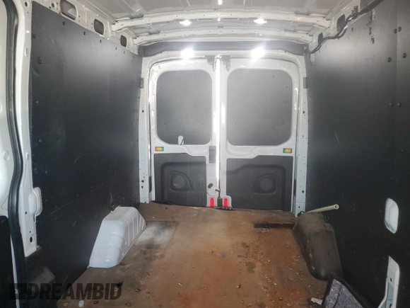 2019 Ford Transit z VIN 1FTYR2CM6KKA28265, wystawiony jako Copart lot #56937345 z przebiegiem 106 541 mil mil oraz Szkoda całkowita • Salvage title. Historia ofert i sprzedaży dostępna na DreamBid. Obrazek 10.