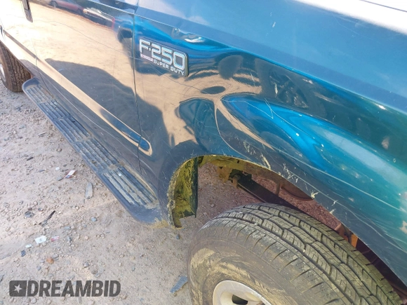 1999 Ford Super Duty F-250 XL with VIN 1FTNW21S2XEE10313, listed as a IAAI auction lot 41825300 with 150,619 mi miles. Bid and sale history available at carsss.com. Image 6.