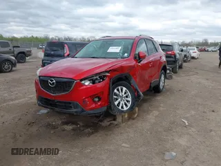 2014 Mazda CX-5 Touring z VIN JM3KE2CY3E0424892, wystawiony jako IAAI lot #42016801 z przebiegiem 173 350 mil mil oraz . Historia ofert i sprzedaży dostępna na DreamBid. Obrazek 12.