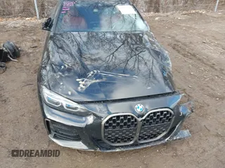 2021 BMW 4 Series M440i xDrive with VIN WBA13AR07MCF99133, listed as a IAAI auction lot 41532804 with 14,983 mi miles and . Bid and sale history available at DreamBid. Image 19.