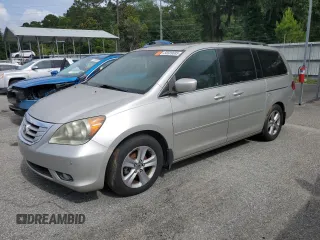 2009 Honda Odyssey Touring с VIN 5FNRL38919B059446, выставлен на аукционе Copart как лот 55509685 с пробегом 200 767 миль миль и Чистый • Clean title. История ставок и продаж доступна на DreamBid. Изображение 1.