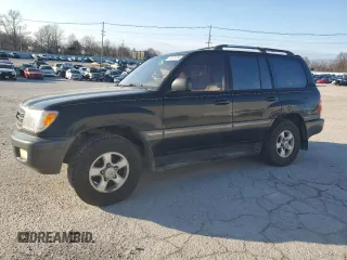 1999 Toyota Land Cruiser z VIN JT3HT05J0X0055476, wystawiony jako Copart lot #85073424 z przebiegiem 318 010 mil mil oraz Szkoda całkowita • Salvage title. Historia ofert i sprzedaży dostępna na DreamBid. Obrazek 1.