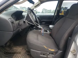 2004 Jeep Grand Cherokee Laredo z VIN 1J4GW48S14C288605, wystawiony jako Copart lot #60204815 z przebiegiem 247 816 mil mil oraz Szkoda całkowita • Salvage title. Historia ofert i sprzedaży dostępna na DreamBid. Obrazek 7.