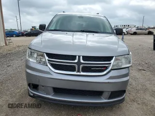 2019 Dodge Journey SE Value with VIN 3C4PDCABXKT810259, listed as a Copart auction lot 54509535 with 153,807 mi miles and Salvage Title. Bid and sale history available at DreamBid. Image 5.