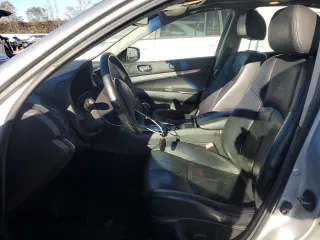 2012 Infiniti G25 Journey with VIN JN1DV6AP0CM700697, listed as a Copart auction lot 80704184 with 148,412 mi miles and Salvage Title. Bid and sale history available at DreamBid. Image 7.