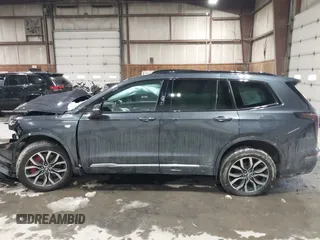 2022 Cadillac XT6 Sport with VIN 1GYKPGRS2NZ164879, listed as a IAAI auction lot 41555242 with 10,862 mi miles. Bid and sale history available at carsss.com. Image 14.