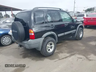 2003 Chevrolet Tracker ZR2 with VIN 2CNBJ734536931923, listed as a IAAI auction lot 41641054 with 111,247 mi miles and . Bid and sale history available at DreamBid. Image 4.
