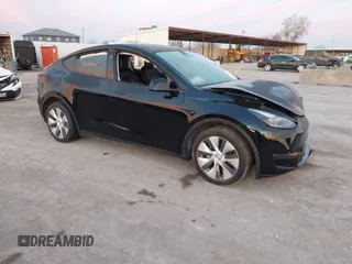 2023 Tesla Model Y Long Range z VIN 7SAYGDEE2PA166042, wystawiony jako IAAI lot #41348960 z przebiegiem Nie podano mil oraz . Historia ofert i sprzedaży dostępna na DreamBid. Obrazek 1.