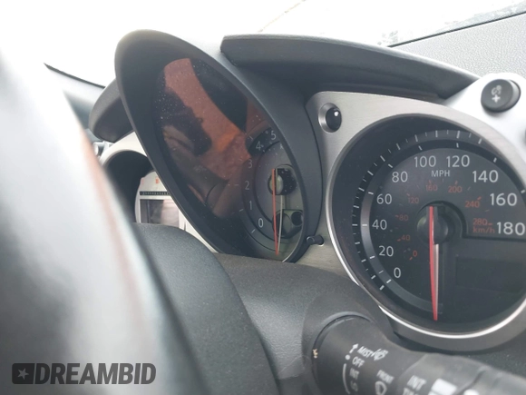 2011 Nissan 370Z Touring z VIN JN1AZ4EH6BM554805, wystawiony jako IAAI lot #41271462 z przebiegiem Nie podano mil oraz . Historia ofert i sprzedaży dostępna na DreamBid. Obrazek 7.