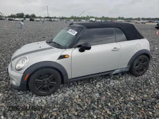 2013 MINI Convertible z VIN WMWZN3C52DT569306, wystawiony jako Copart lot #56594535 z przebiegiem 80 247 mil mil oraz Czysty tytuł • Clean title. Historia ofert i sprzedaży dostępna na DreamBid. Obrazek 1.