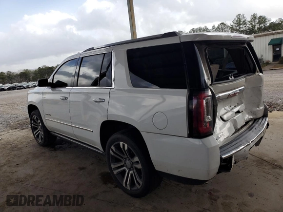 2017 GMC Yukon Denali with VIN 1GKS1CKJ1HR188049, listed as a Copart auction lot 89266975 with 140,516 mi miles and Salvage Title. Bid and sale history available at carsss.com. Image 2.