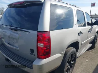 2007 Chevrolet Tahoe LTZ with VIN 1GNFC13077J399911, listed as a IAAI auction lot 41141878 with Not provided miles and . Bid and sale history available at DreamBid. Image 4.