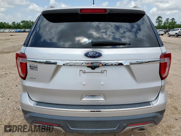 2018 Ford Explorer XLT with VIN 1FM5K7D85JGA54665, listed as a Copart auction lot 61153785 with 59,877 mi miles and Salvage title. Bid and sale history available at DreamBid. Image 6.