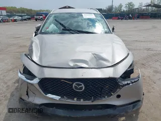 2022 Mazda CX-30 S Select z VIN 3MVDMBBL2NM439681, wystawiony jako IAAI lot #41960902 z przebiegiem 22 730 mil mil oraz . Historia ofert i sprzedaży dostępna na DreamBid. Obrazek 12.