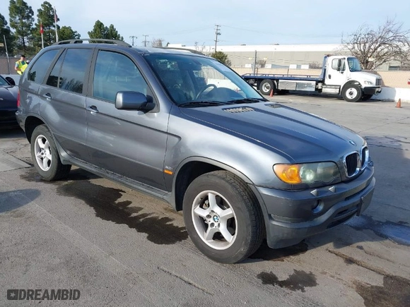 2003 BMW X5 3.0i with VIN 5UXFA53573LV83812, listed as a IAAI auction lot 41590046 with 166,841 mi miles. Bid and sale history available at carsss.com. Image 1.