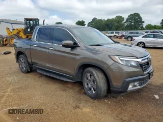 2020 Honda Ridgeline RTL-E with VIN 5FPYK3F79LB001891, listed as a Copart auction lot 58569255 with 34,513 mi miles and Salvage title. Bid and sale history available at DreamBid. Image 4.