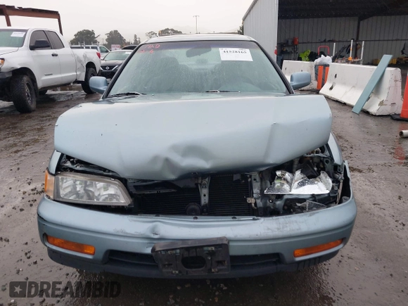 1994 Honda Accord EX w/Leather with VIN 1HGCD5657RA119657, listed as a IAAI auction lot 41528165 with 119,458 mi miles. Bid and sale history available at carsss.com. Image 12.