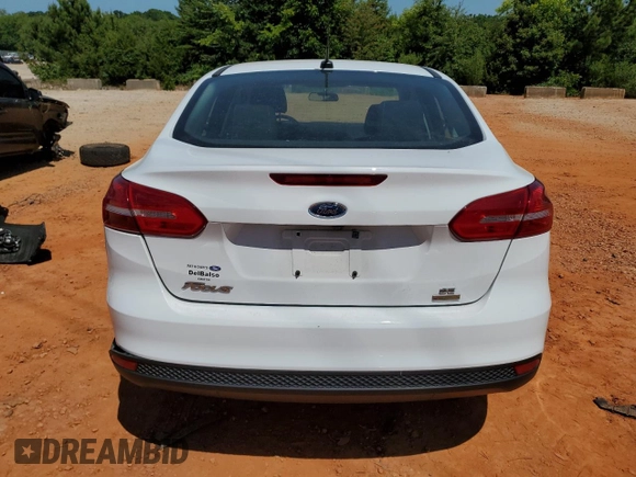 2018 Ford Focus SE with VIN 1FADP3FE9JL264664, listed as a Copart auction lot 61726905 with 28,471 mi miles and Salvage title. Bid and sale history available at DreamBid. Image 6.