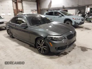 2020 BMW 2 Series 230i xDrive with VIN WBA2J3C07L7E64031, listed as a IAAI auction lot 41458356 with 43,594 mi miles. Bid and sale history available at carsss.com. Image 1.