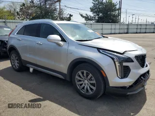 2019 Cadillac XT4 AWD Premium Luxury with VIN 1GYFZDR48KF194395, listed as a Copart auction lot 54148645 with 52,561 mi miles and Salvage Title. Bid and sale history available at carsss.com. Image 4.