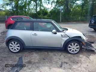 2007 MINI Hardtop S with VIN WMWMF73537TL88038, listed as a IAAI auction lot 42200252 with 70,603 mi miles and . Bid and sale history available at DreamBid. Image 14.