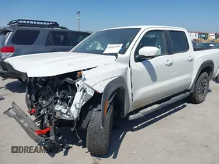 2024 Nissan Frontier PRO-4X with VIN 1N6ED1EKXRN651496, listed as a IAAI auction lot 41801908 with 7,058 mi miles. Bid and sale history available at carsss.com. Image 2.