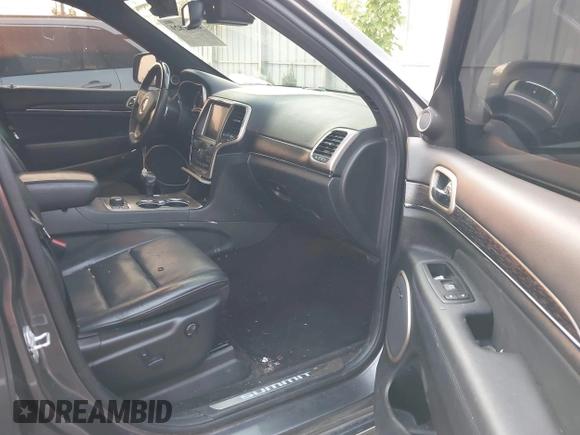 2015 Jeep Grand Cherokee Summit with VIN 1C4RJFJT3FC748507, listed as a IAAI auction lot 40271829 with 86,859 mi miles. Bid and sale history available at carsss.com. Image 5.