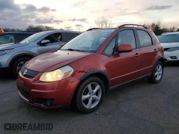 2009 Suzuki SX4 Man AWD with VIN JS2YB413696201043, listed as a Copart auction lot 86283064 with 153,286 mi miles and Salvage Title. Bid and sale history available at carsss.com. Image 1.