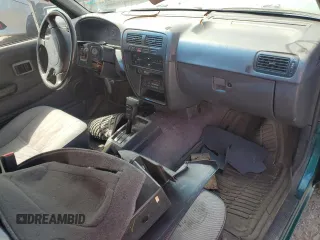 1995 Nissan Frontier XE z VIN 1N6HD16S7SC401954, wystawiony jako Copart lot #52923105 z przebiegiem 98 441 mil mil oraz Szkoda całkowita • Salvage title. Historia ofert i sprzedaży dostępna na DreamBid. Obrazek 8.