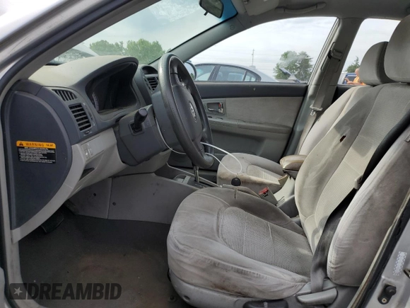 2007 Kia Spectra EX with VIN KNAFE121375410633, listed as a Copart auction lot 57424305 with Not provided miles and Salvage title. Bid and sale history available at DreamBid. Image 7.