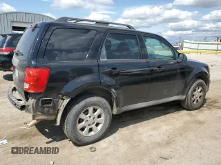 2010 Mazda Tribute Grand Touring with VIN 4F2CY0C78AKM03177, listed as a Copart auction lot 66729164 with 75,400 mi miles and Salvage Title. Bid and sale history available at carsss.com. Image 3.
