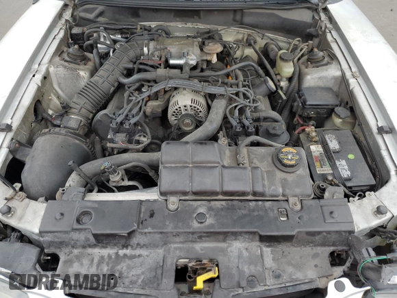 1998 Ford Mustang GT z VIN 1FAFP42XXWF229613, wystawiony jako Copart lot #63231905 z przebiegiem 65 669 mil mil oraz Szkoda całkowita • Salvage title. Historia ofert i sprzedaży dostępna na DreamBid. Obrazek 11.