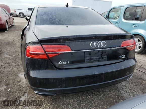 2018 Audi A8 z VIN WAU44AFD0JN000782, wystawiony jako Copart lot #68575924 z przebiegiem 99 098 mil mil oraz Nie do naprawy • Non repairable. Historia ofert i sprzedaży dostępna na DreamBid. Obrazek 6.