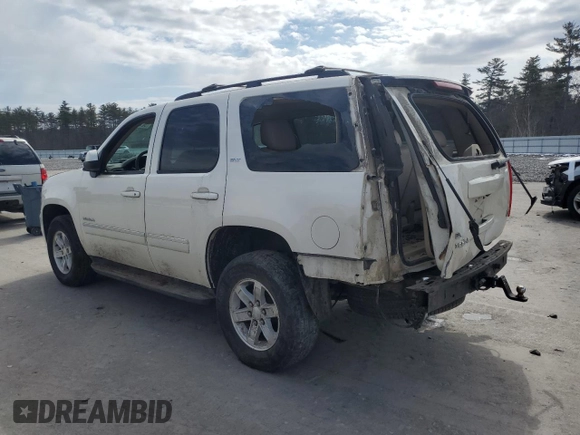 2012 GMC Yukon SLT with VIN 1GKS2CE05CR242879, listed as a Copart auction lot 50725855 with 162,506 mi miles and Salvage Title. Bid and sale history available at carsss.com. Image 2.
