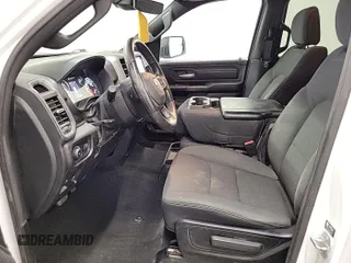 2023 Ram 1500 Tradesman with VIN 1C6RRFGG5PN620480, listed as a IAAI auction lot 42677838 with 23,965 mi miles and . Bid and sale history available at DreamBid. Image 1.