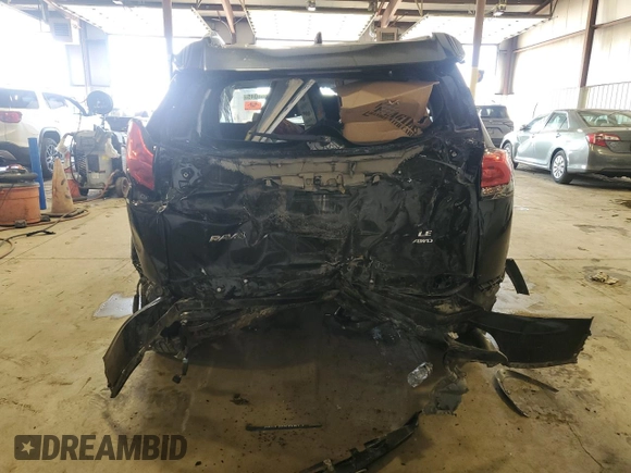 2018 Toyota RAV4 LE with VIN 2T3BFREV7JW717699, listed as a Copart auction lot 60656045 with Not provided miles and Salvage title. Bid and sale history available at DreamBid. Image 6.