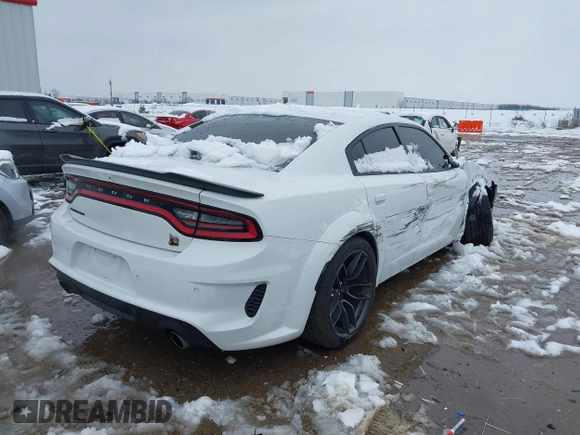 2022 Dodge Charger Scat Pack Widebody with VIN 2C3CDXGJ4NH183094, listed as a IAAI auction lot 41300119 with 31,800 mi miles and . Bid and sale history available at carsss.com. Image 4.