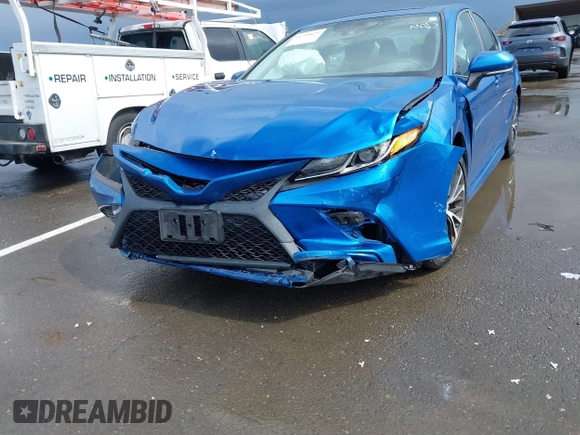 2019 Toyota Camry LE z VIN 4T1B11HK1KU282870, wystawiony jako IAAI lot #41799625 z przebiegiem 63 977 mil mil oraz . Historia ofert i sprzedaży dostępna na DreamBid. Obrazek 6.