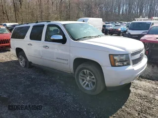2008 Chevrolet Suburban LT w/3LT with VIN 3GNFK16328G163677, listed as a Copart auction lot 49974215 with 153,741 mi miles and Salvage Title. Bid and sale history available at carsss.com. Image 4.