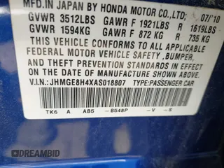 2010 Honda Fit Sport with VIN JHMGE8H4XAS018807, listed as a IAAI auction lot 41990369 with 63,151 mi miles. Bid and sale history available at carsss.com. Image 9.