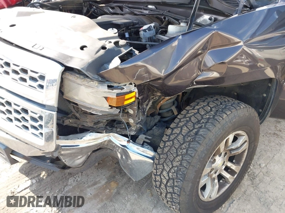 2014 Chevrolet Silverado 1500 LT with VIN 3GCPCREC7EG135069, listed as a IAAI auction lot 41999001 with 208,720 mi miles and . Bid and sale history available at DreamBid. Image 6.