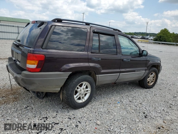 2004 Jeep Grand Cherokee Laredo with VIN 1J4GW48S64C121057, listed as a Copart auction lot 67765474 with 166,359 mi miles and Salvage title. Bid and sale history available at DreamBid. Image 3.