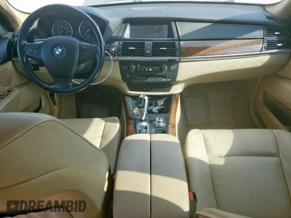 2012 BMW X5 35i с VIN 5UXZV4C52CL988794, выставлен на аукционе Copart как лот 61688485 с пробегом Не указан миль и Чистый • Clean title. История ставок и продаж доступна на DreamBid. Изображение 8.