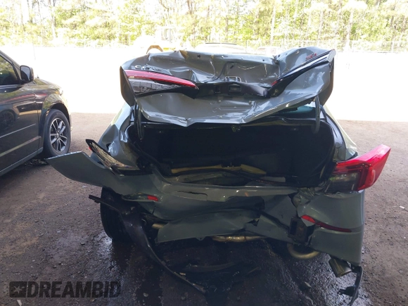 2022 Honda Civic Si with VIN 2HGFE1E52NH474042, listed as a IAAI auction lot 42099415 with 26,828 mi miles and . Bid and sale history available at DreamBid. Image 6.
