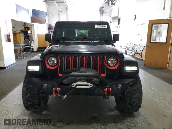 2020 Jeep Wrangler Unlimited Sahara z VIN 1C4HJXEN8LW118599, wystawiony jako Copart lot #60687535 z przebiegiem 74 824 mil mil oraz Czysty tytuł • Clean title. Historia ofert i sprzedaży dostępna na DreamBid. Obrazek 5.