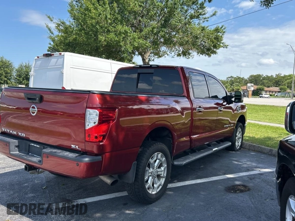 2016 Nissan Titan SL z VIN 1N6BA1F26GN512666, wystawiony jako Copart lot #59731495 z przebiegiem 120 182 mil mil oraz Czysty tytuł • Clean title. Historia ofert i sprzedaży dostępna na DreamBid. Obrazek 4.